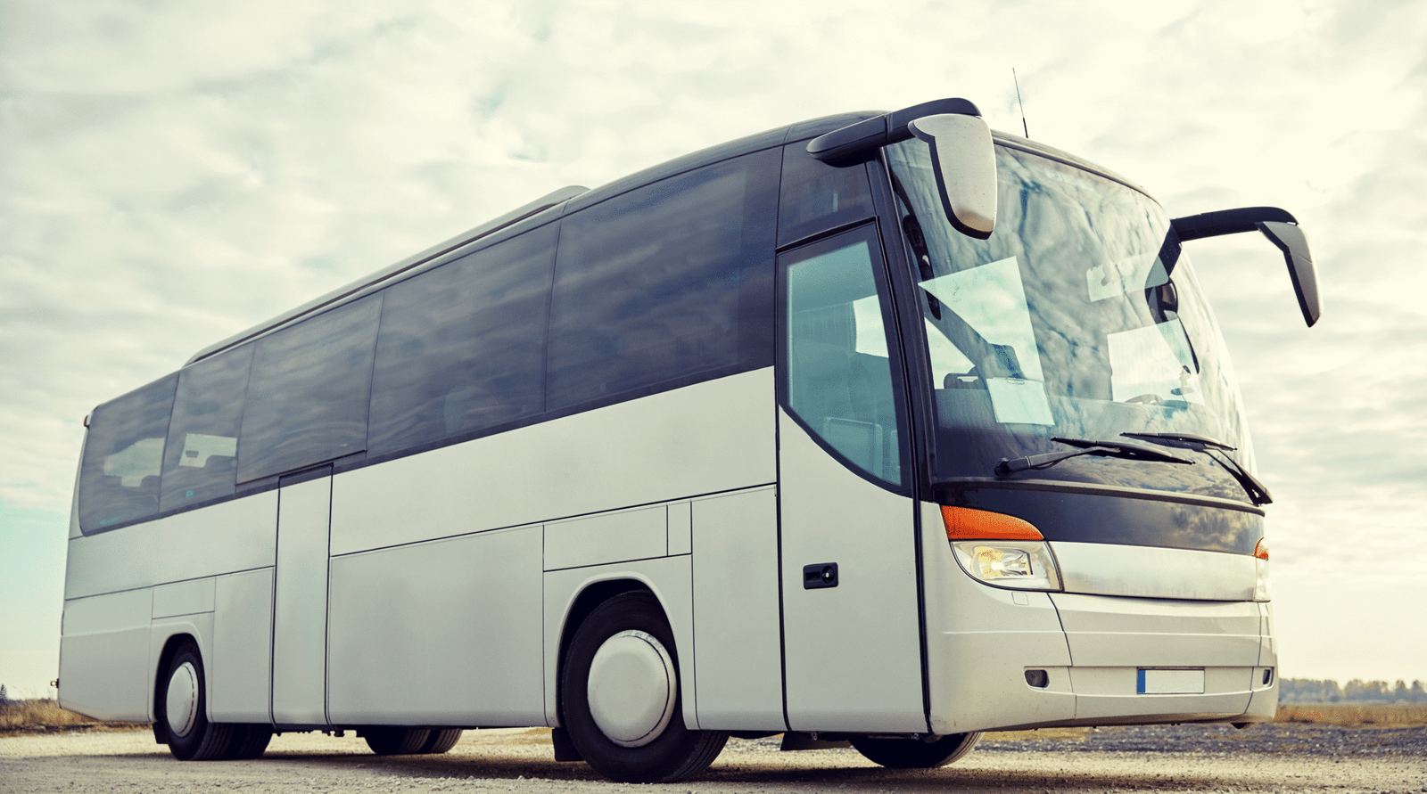 tour-bus-driving-outdoors-2024-09-28-03-58-47-utc